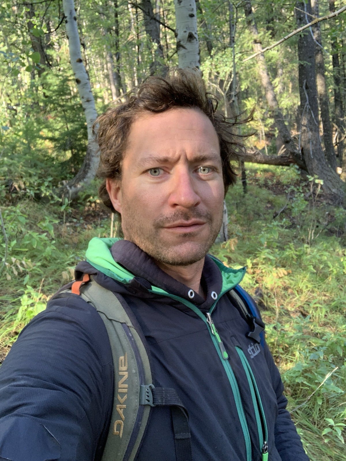 Brian Vaughan on a forested trail